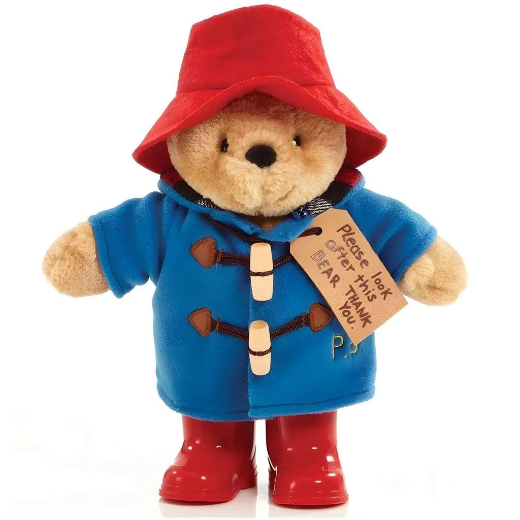 Adorable Paddington Bear, soft toy, bear standing, wearing clothes.